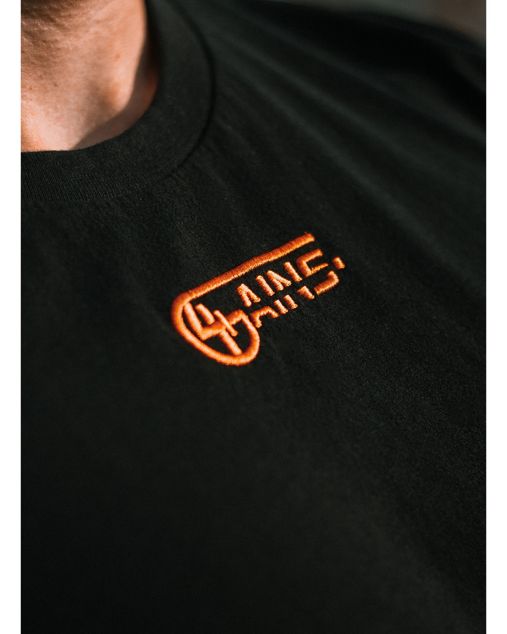4GAINS basic unisex T-Shirt in black/orange