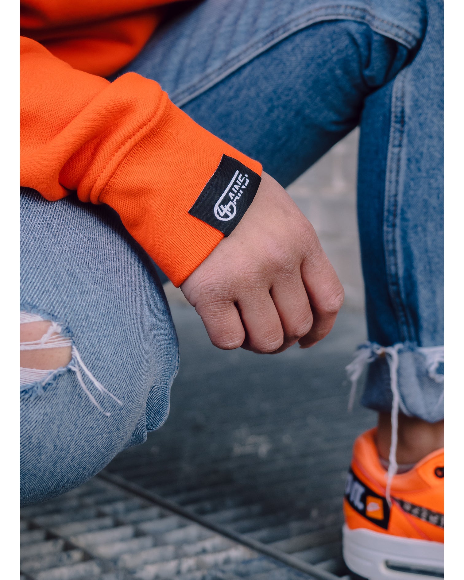 Weblabel am Arm vom 4GAINS orange/black Sweaterkleid 